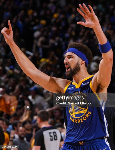 Klay Thompson of the Golden State Warriors celebrates against the Memphis Grizzlies during Game 6 of the 2022 NBA Playoffs Western Conference...