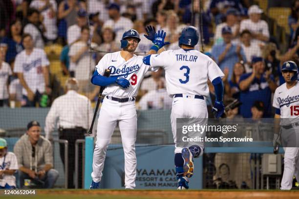 Los Angeles Dodgers left fielder Chris Taylor hits a home run in the 3rd inning during a regular season game between the Los Angeles Dodgers and...