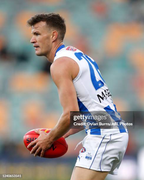 Kayne Turner of the Kangaroos looks on during the 2022 AFL Round 09 match between the North Melbourne Kangaroos and the Port Adelaide Power at...