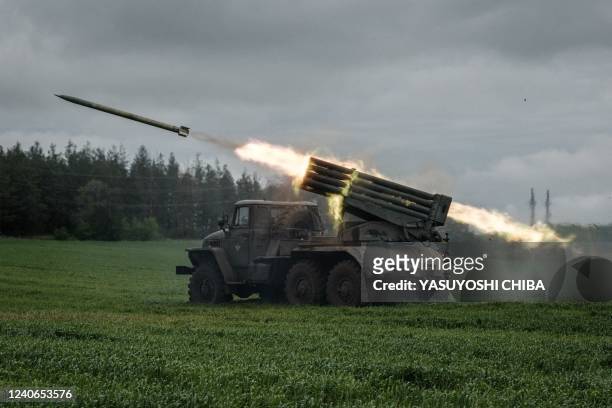 Rocket is launched from a truck-mounted multiple rocket launcher near Svyatohirsk, eastern Ukraine, on May 14 amid the Russian invasion of Ukraine.