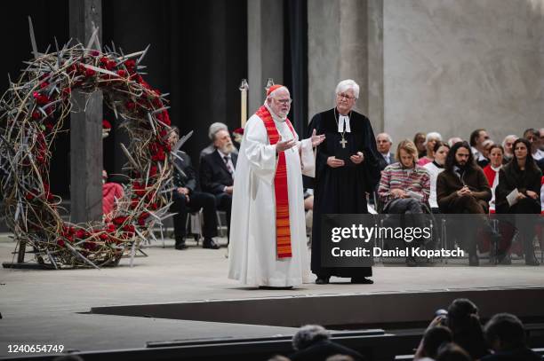 Cardinal Reinhard Marx and Chairman of the Council of the Evangelical Church in Germany , Heinrich Bedford-Strohm, during an ecumenical opening...
