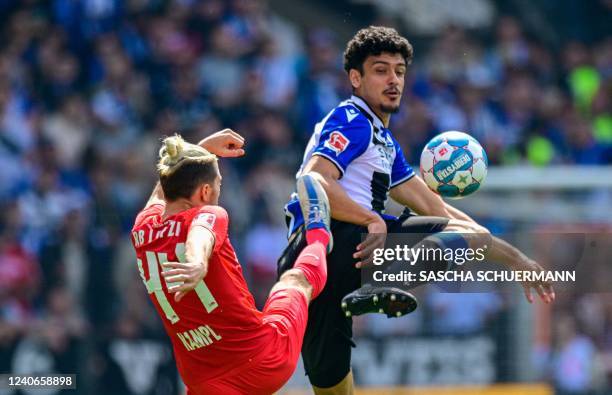 Bielefeld's Portuguese defender Guilherme Ramos and Leipzig's Slovenian midfielder Kevin Kampl vie for the ball during the German first division...