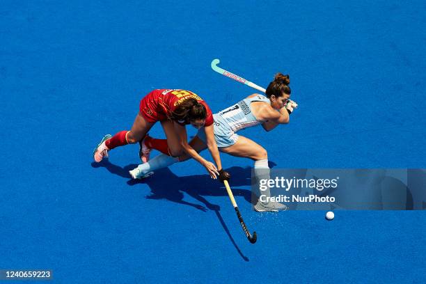 Agustina Albertarrio of Argentina competes for the ball with Candela Mejias of Spain during the FIH Hockey Pro League Women game between Spain and...