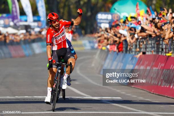 Team Lotto's Belgian rider Thomas De Gendt celebrates as he crosses the finish line to win the 8th stage of the Giro d'Italia 2022, 153 kilometers...