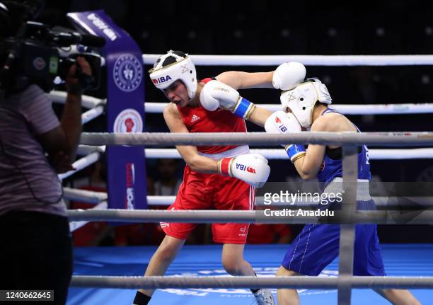 Ayse Cagirir of Turkiye competes with Rim Bennama of France during women's 48 kg match on the sixth day of the International Boxing Association...