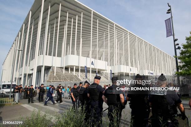 Riot police forces stand guard outside The Matmut stadium ahead of the French L1 football match between Girondins de Bordeaux and FC Lorient in...