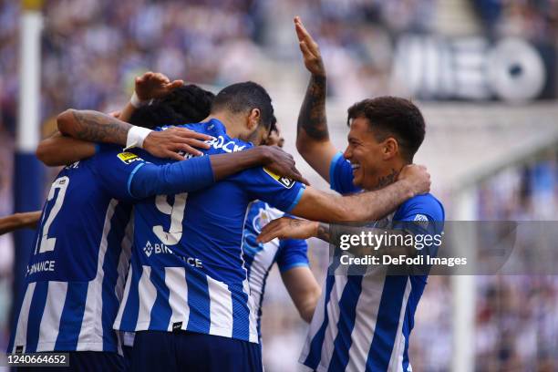 Porto Players celebrate after Joaozinho of GD Estoril Praia own goal during the Liga Portugal Bwin match between FC Porto and GD Estoril Praia at...