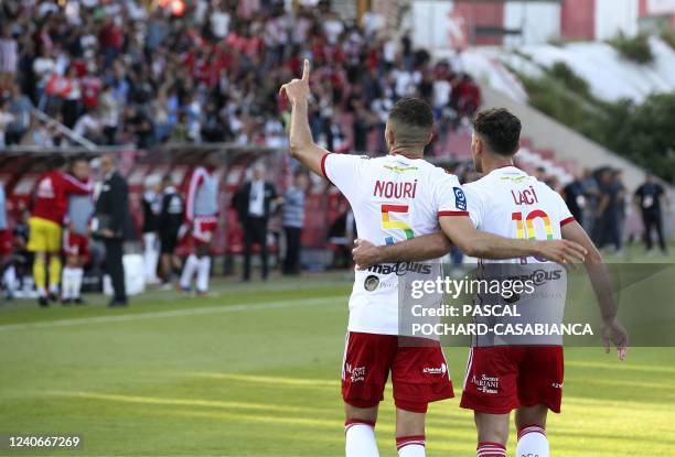 Ajaccio's French midfielder Riad Nouri celebrates after scoring a goal, with teammate French midfielder Qazim Laci during the last L2 football match...