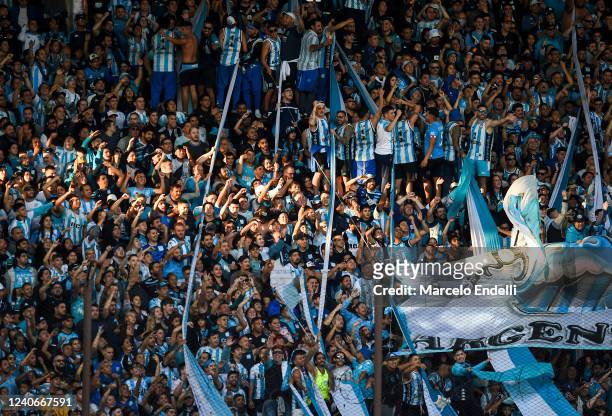 Fans of Racing Club cheer for their team before a semi-final match of Copa De la Liga 2022 between Boca Juniors and Racing Club at Estadio Ciudad de...
