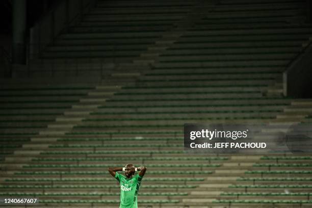 Saint-Etiennes French defender Eliaquim Mangala reacts during the French L1 football match between Saint-Etienne and Stade de Reims at The Geoffroy...