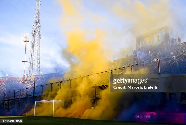 Smoke flares with the colors of Boca Juniors are seen before a semi-final match of Copa De la Liga 2022 between Boca Juniors and Racing Club at...