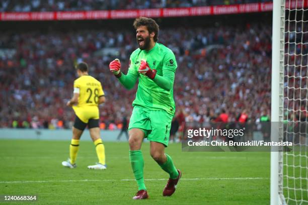 Alisson of Liverpool reacts to Cesar Azpilicueta of Chelsea missing a penalty in a shootout during The FA Cup Final match between Chelsea and...