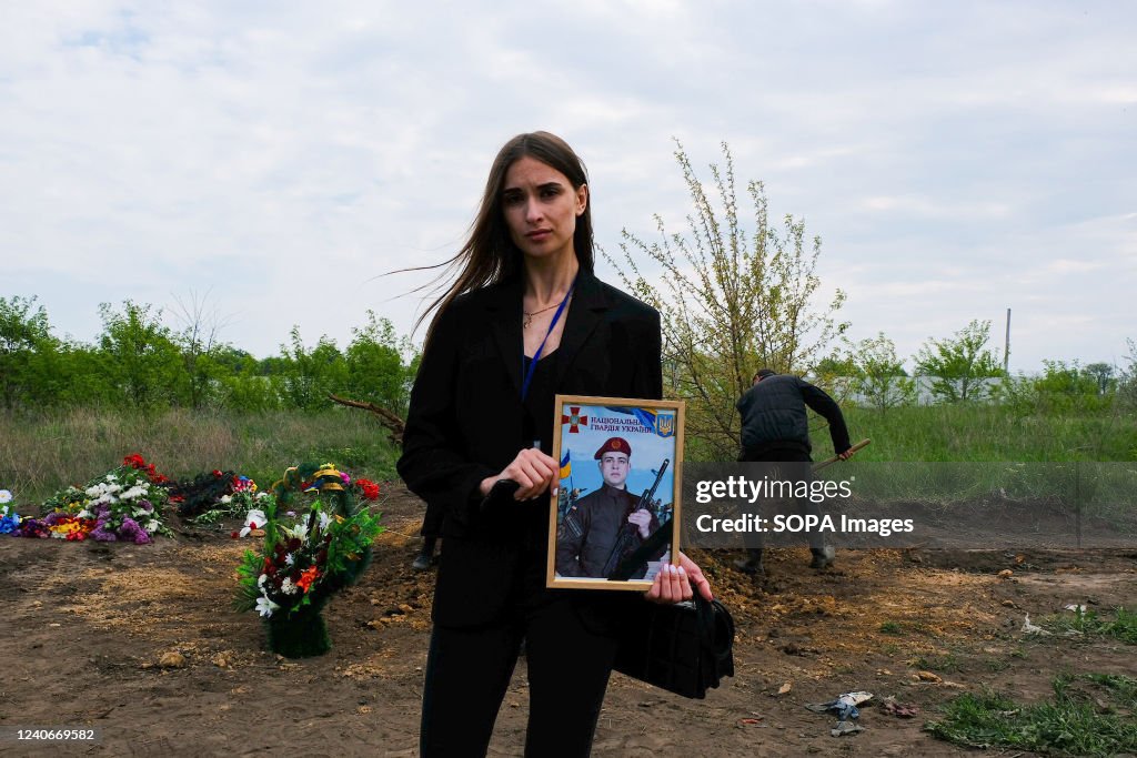 A cousin of a dead soldier, Sergey Titov, 32 years old,...