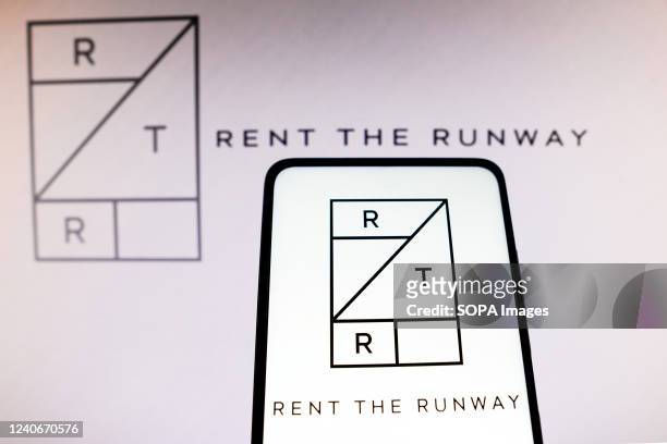 In this photo illustration the Rent the Runway logo seen displayed on a smartphone and in the background.