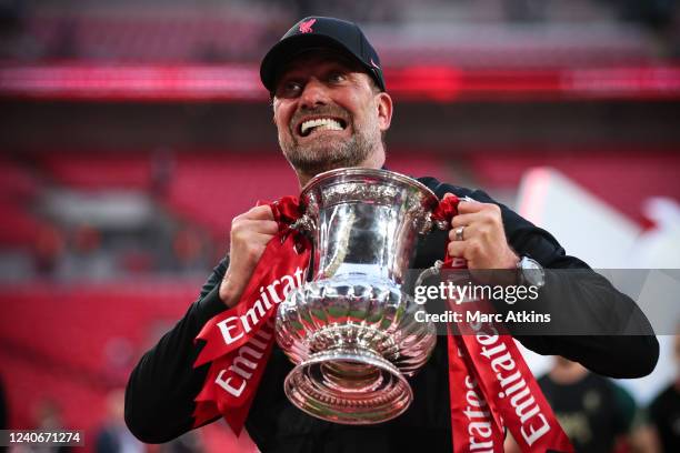 Jurgen Klopp, Manager of Liverpool celebrates with the Emirates FA Cup trophy following his team's victory in The FA Cup Final match between Chelsea...