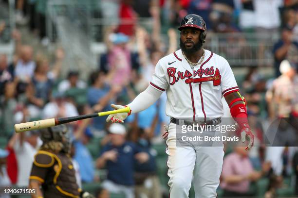 Marcell Ozuna of the Atlanta Braves hits a two-run home run in the eighth inning of a game against the San Diego Padres at Truist Park on May 14,...