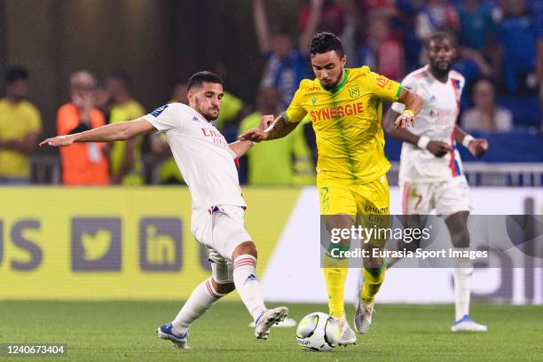 Houssem Aouar of Lyon fights for the ball with Fabio da Silva of Nantes during the Ligue 1 Uber Eats match between Olympique Lyonnais and FC Nantes...