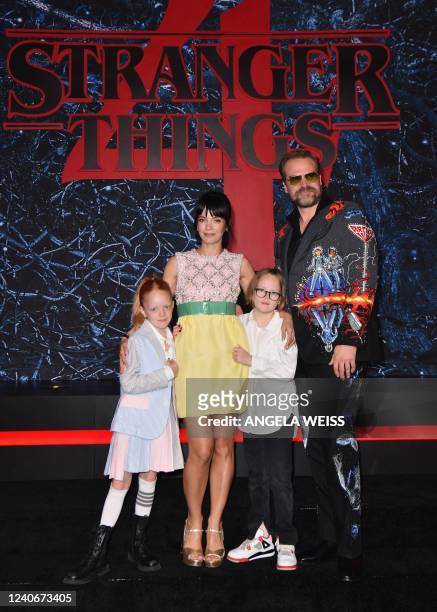 English singer Lily Allen , daughters Marnie Rose Cooper and Ethel Cooper , and US actor David Harbour attend "Stranger Things" season 4 premiere at...