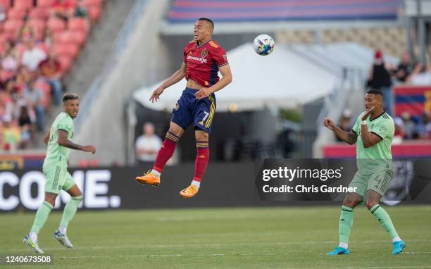 Bobby Wood of Real Salt Lake misses a head ball as Ruben Gabrielsen of the Austin FC waits for the ball during the first half of their game May 14,...