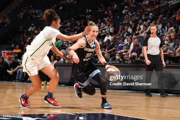 Courtney Vandersloot of the Chicago Sky drives to the basket against the Minnesota Lynx on May 14, 2022 at Target Center in Minneapolis, Minnesota....