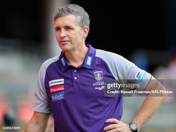 Justin Longmuir, Senior Coach of the Dockers is seen on the ground before the 2022 AFL Round 09 match between the Gold Coast Suns and the Fremantle...