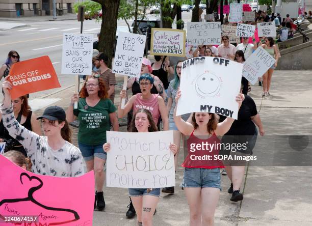 Protesters hold placards expressing their opinion at a pro abortion rights rally. People from many different cities gathered to support and rally for...
