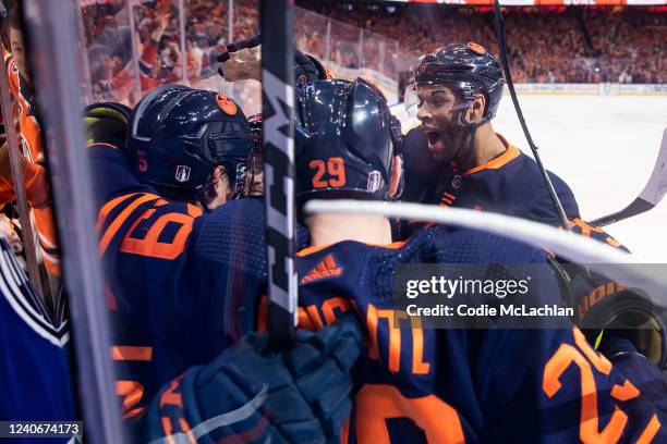 Cody Ceci, Leon Draisaitl and Darnell Nurse of the Edmonton Oilers celebrate a goal against the Los Angeles Kings during the second period in Game...