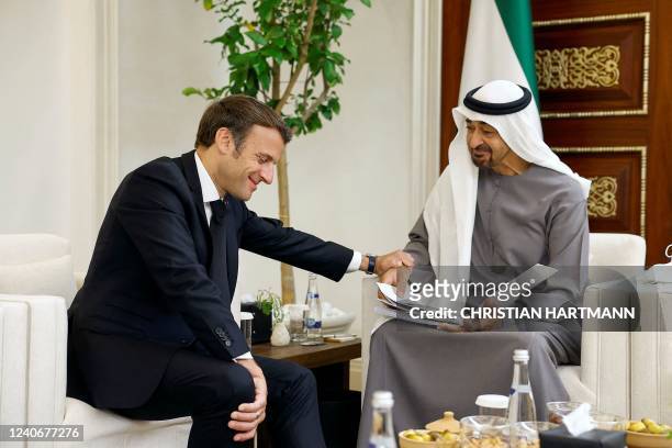 French President Emmanuel Macron meets newly-elected president of the United Arab Emirates Sheikh Mohammed bin Zayed Al Nahyan at Al Mushrif Palace...