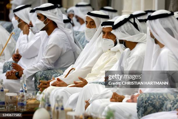 Attendees gather to mourn the death of UAE's President Sheikh Khalifa Bin Zayed Al Nahyan at Al Mushrif Palace in Abu Dhabi, United Arab Emirates, on...