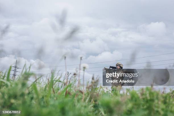 Ukrainian soldier is seen with an anti-aircraft weapon in Donetsk Oblast, Ukraine on May 14, 2022.