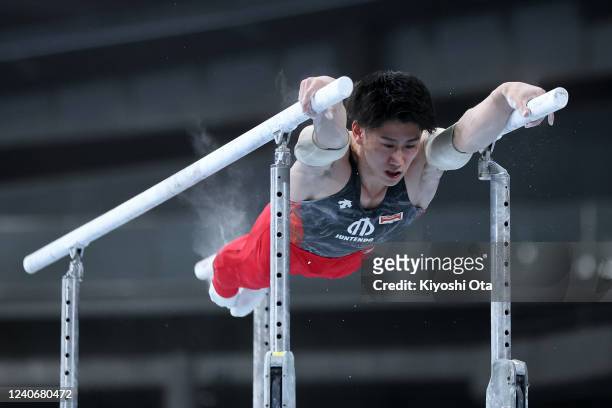 Daiki Hashimoto competes in the Men's Parallel Bars on day two of the 61st Artistic Gymnastics NHK Trophy at Tokyo Metropolitan Gymnasium on May 15,...