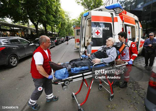 Members of the Red Cross evacuate people with disabilities to Moldova's Chisinau from Odessa, Ukraine, on May 14, 2022.