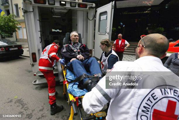 Members of the Red Cross evacuate people with disabilities to Moldova's Chisinau from Odessa, Ukraine, on May 14, 2022.