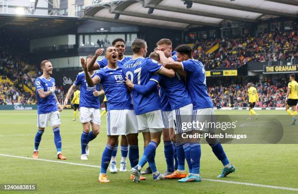 Harvey Barnes of Leicester City celebrates with his team mates after scoring to make it 1-3 during the Premier League match between Watford and...