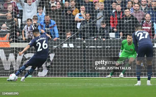 Manchester City's Algerian midfielder Riyad Mahrez misses to score a penalty kick during the English Premier League football match between West Ham...