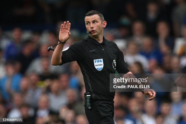 Referee Michael Oliver reacts during the English Premier League football match between Everton and Brentford at Goodison Park in Liverpool, north...