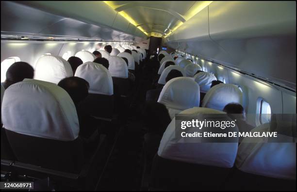 Inside the Concorde with the Michelin employees who worked on its new tires In France On December 15, 2001 - Passengers cabin.