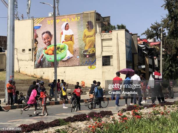 People, riding bike, are seen on the street emptied by cars during " Car Free Day" event in Addis Ababa, Ethiopia on May 15, 2022. Some roads in the...