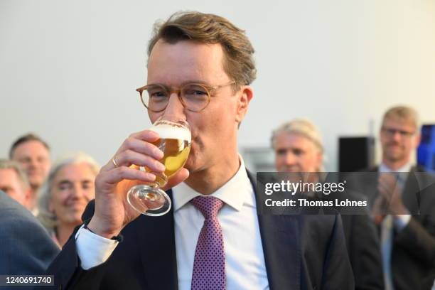 Hendrik Wuest, incumbent and lead candidate of the German Christian Democrats , reacts after exit polls for the North-Rhine Westphalia state election...