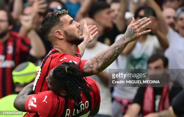 Milan's French defender Theo Hernandez celebrates with AC Milan's Portuguese forward Rafael Leao a goal during the Italian Serie A football match...