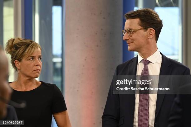 Green's top candidate Mona Neubaur and Hendrik Wuest, incumbent and lead candidate of the German Christian Democrats , attend a TV talk show after...