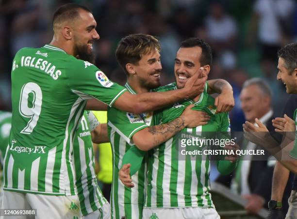 Real Betis' Spanish forward Juanmi celebrates scoring his team's second goal during the Spanish league football match between Real Betis and Granada...