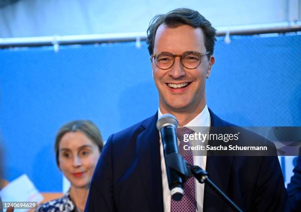 Hendrik Wuest, incumbent and lead candidate of the German Christian Democrats , celebrates with supporters after the exit polls for the North-Rhine...