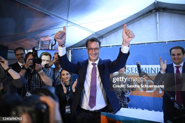 Hendrik Wuest, incumbent and lead candidate of the German Christian Democrats , celebrates with supporters after the exit polls for the North-Rhine...