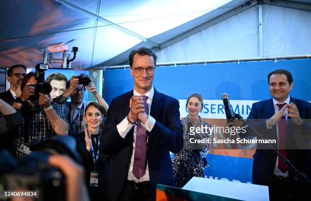 Hendrik Wuest, incumbent and lead candidate of the German Christian Democrats , celebrates with supporters after the exit polls for the North-Rhine...