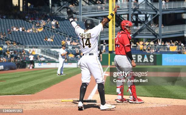 Rodolfo Castro of the Pittsburgh Pirates reacts after coming around to score on a run scoring fielders choice off the bat of Ke'Bryan Hayes of the...