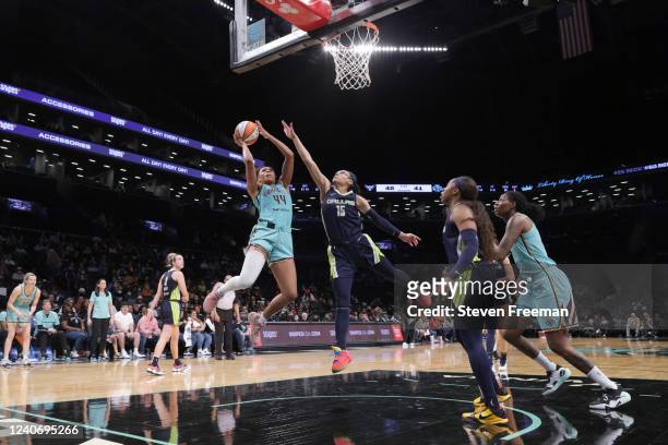 Betnijah Laney of the New York Liberty drives to the basket during the game against the Dallas Wings on May 15, 2022 at Barclays Center in Brooklyn,...
