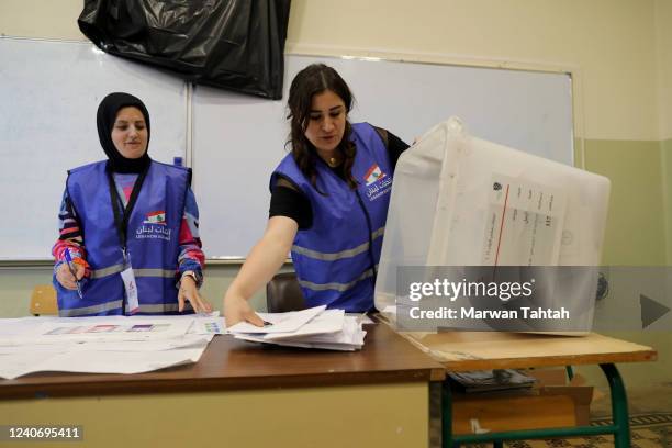 Poll workers prepare to count votes in the countrys parliamentary elections on May 15, 2022 in Beirut, Lebanon. Lebanese head to the polls for the...