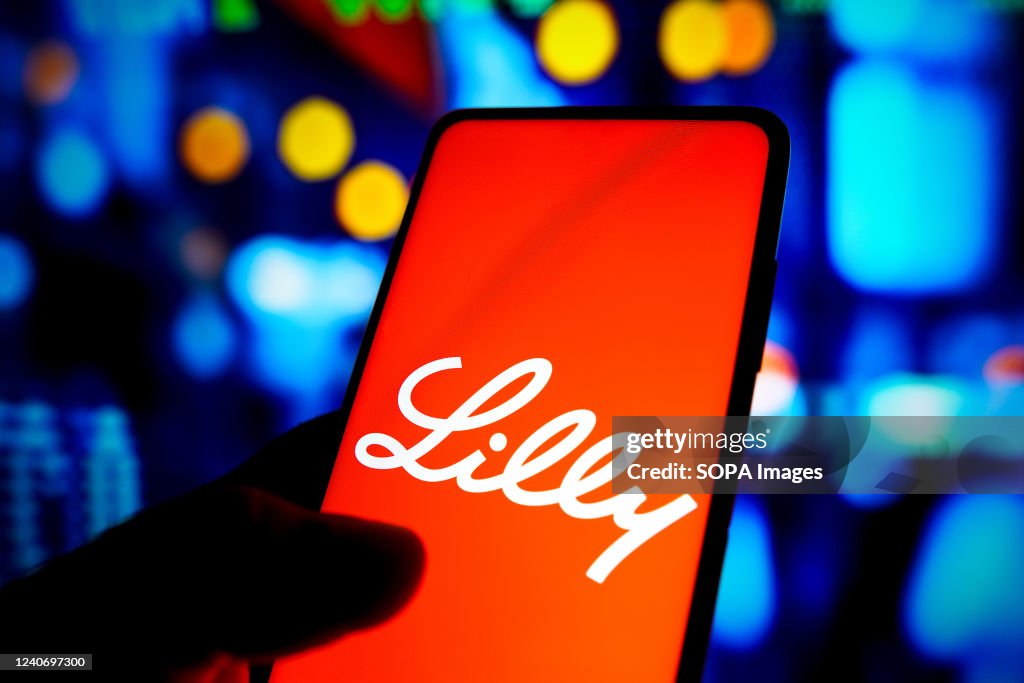 In this photo illustration the Eli Lilly and Company logo...