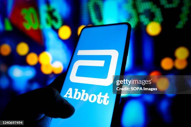 In this photo illustration the Abbott Laboratories logo seen displayed on a smartphone.
